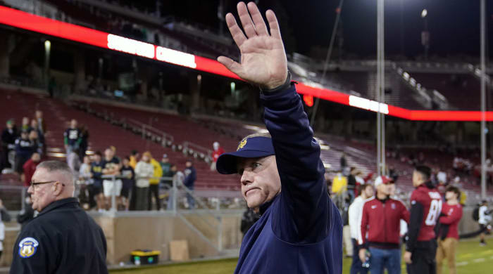 Notre Dame Fighting Irish head coach Brian Kelly walks off the field after game.